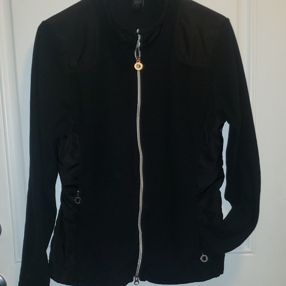 Women's black zip-up jacket with zip-up pockets